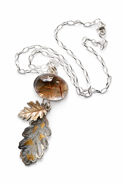 Rutilated Quartz Pendant with Hand Engraved Leaves
