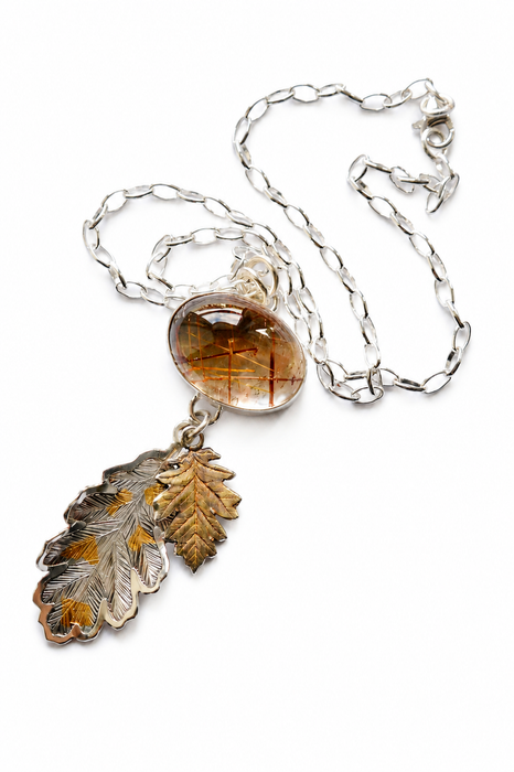 Rutilated Quartz Pendant with Hand Engraved Leaves
