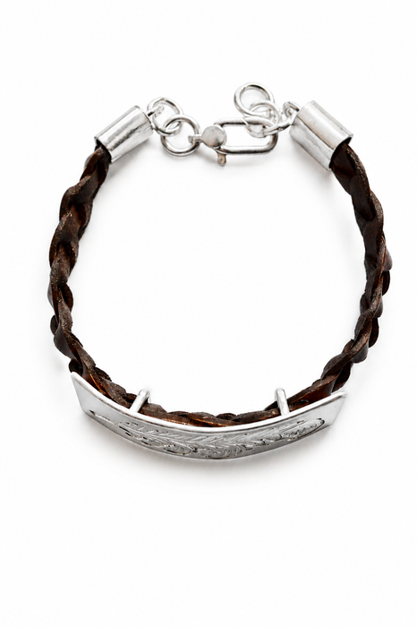 Hand engraved silver feather leather cuff