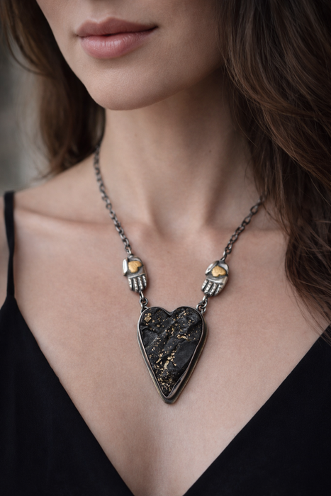 Raw Pyrite Onyx Heart Necklace with Gilded Silver Hands