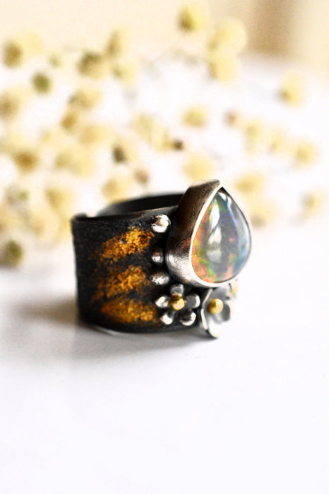 Fiery Ethiopian Opal Ring with Gold Details