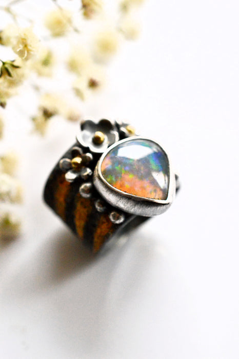Fiery Ethiopian Opal Ring with Gold Details