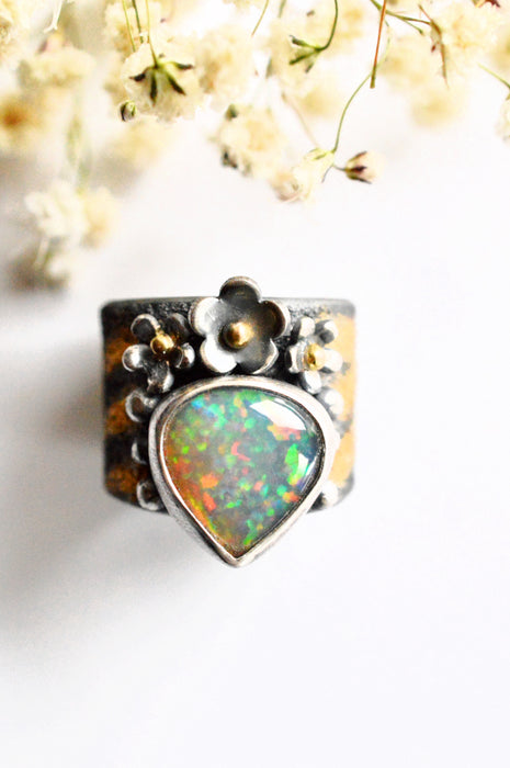 Fiery Ethiopian Opal Ring with Gold Details