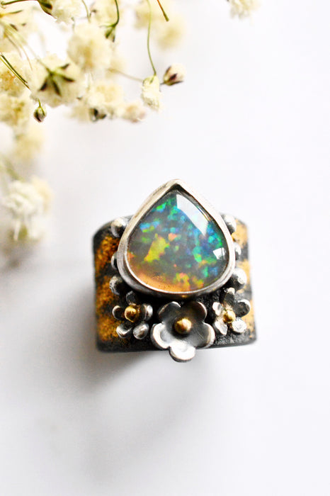 Fiery Ethiopian Opal Ring with Gold Details