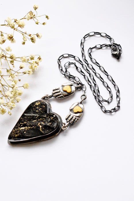 Raw Pyrite Onyx Heart Necklace with Gilded Silver Hands