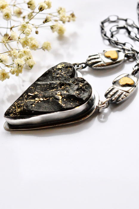 Raw Pyrite Onyx Heart Necklace with Gilded Silver Hands