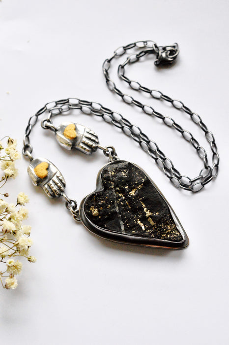 Raw Pyrite Onyx Heart Necklace with Gilded Silver Hands