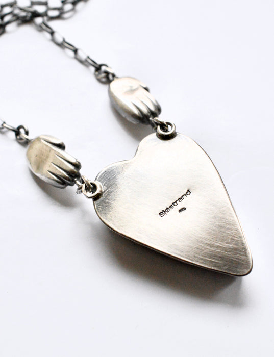 Raw Pyrite Onyx Heart Necklace with Gilded Silver Hands
