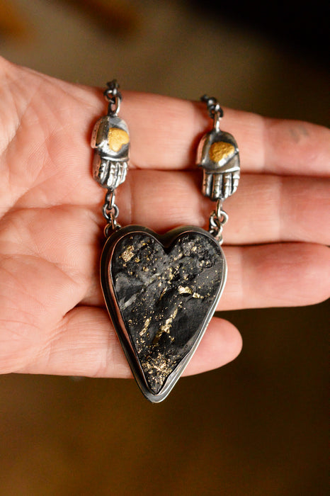 Raw Pyrite Onyx Heart Necklace with Gilded Silver Hands